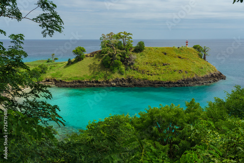 Turquoise Waters and Lush Greenery at Ilheu das Cabras photo