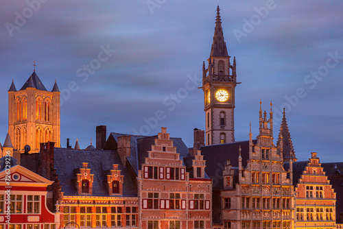 Aerial view of medieval buildings and towers of Old Town at night, Ghent, Belgium