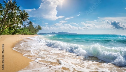 Beautiful tropical wave of summer sea surf. Soft turquoise blue ocean wave on the golden sandy beach. © blackdiamond67