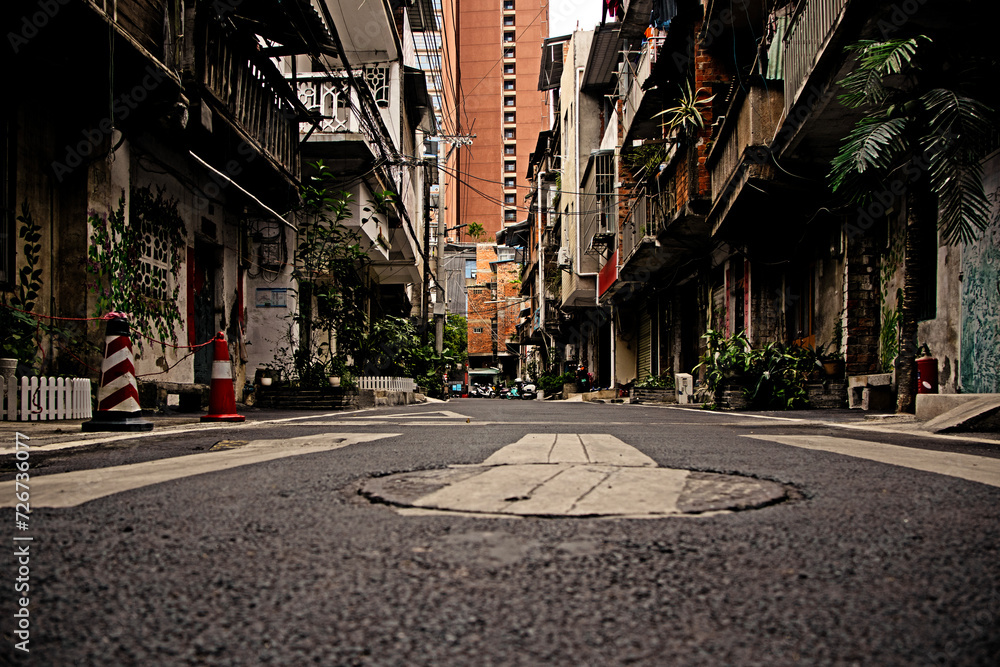 alley, street, Kitay, gorodsky background, paths, clear spring day, short street in a poor area, interesting, hatching, marking on asphalt in white, residential buildings, balconies, green plants