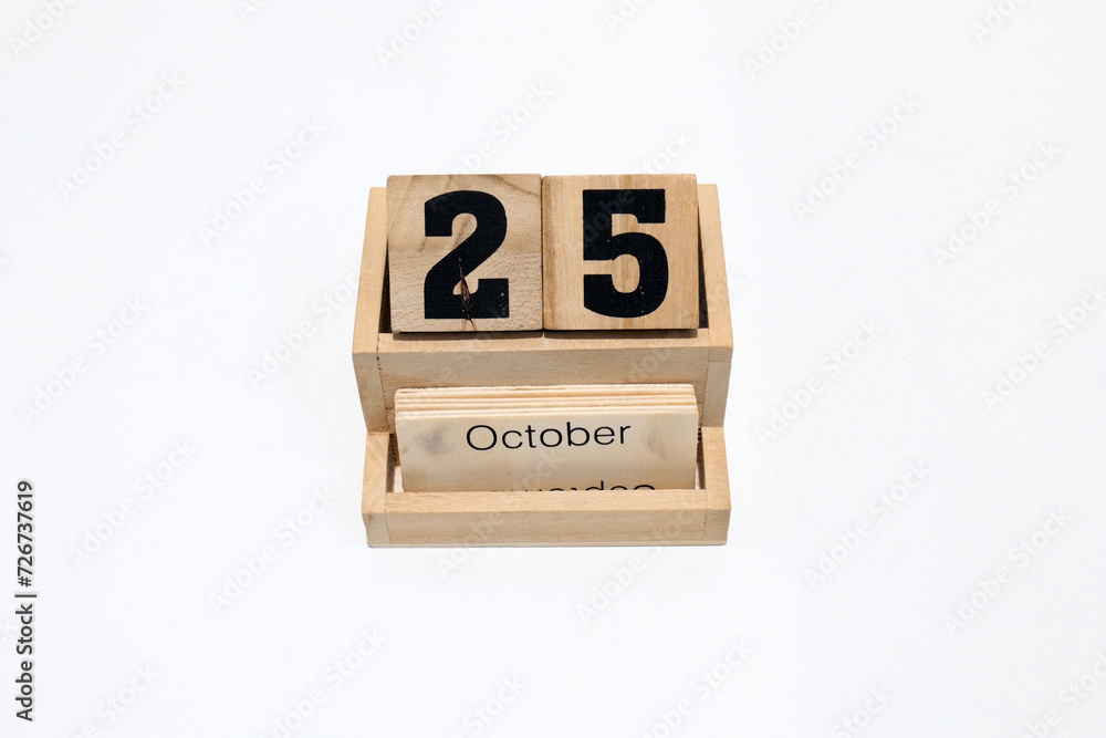 25th of October wooden perpetual calendar. Shot close up isolated on a white background 25th of October wooden perpetual calendar. Shot close up isolated on a white background