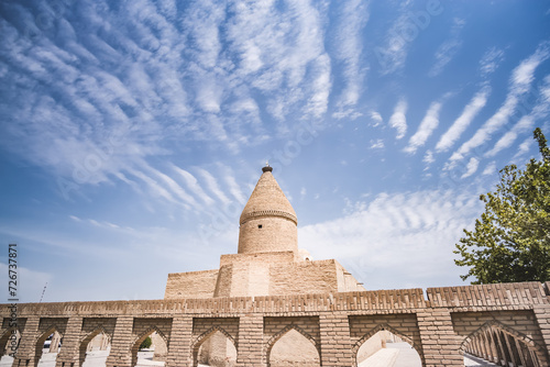Mausoleum of Chashmai Ayub in the ancient city of Bukhara in Uzbekistan on a warm summer sunny day photo