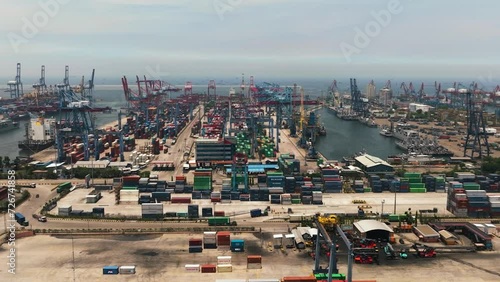 Jakarta, Indonesia docks with containers and port cranes in the sea cargo port. Tanjung Priok. photo