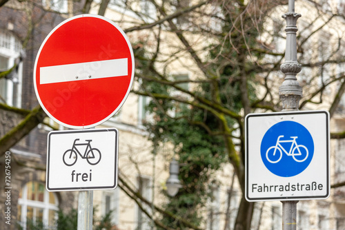 Fototapeta Naklejka Na Ścianę i Meble -  Bicycle street in Berlin with two traffic signs: 