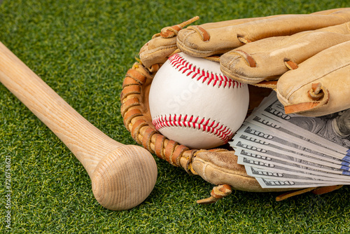 Konstfotografi Baseball, glove and wooden bat with cash money