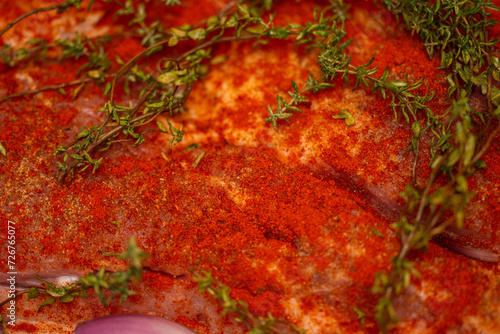 Pork belly steak seasoned with thyme, red onion, garlic and tomato sauce, stages of preparation © Laurenx