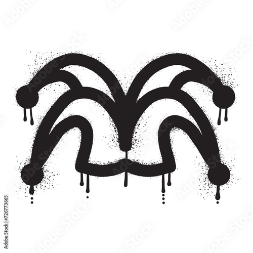 Jester hat graffiti drawn with black spray paint