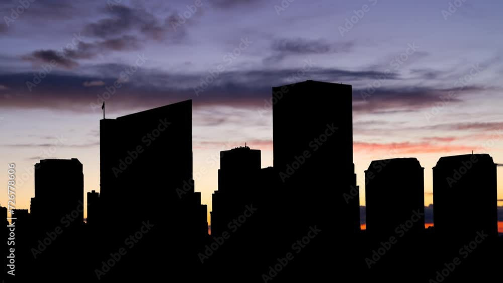 Richmond Downtown at Twilight, Time Lapse with Colourful Sky and Dark Silhouette of Skyscrapers Virginia, USA Richmond Downtown at Twilight, Time Lapse with Colourful Sky and Dark Silhouette of Skyscrapers Virginia, USA