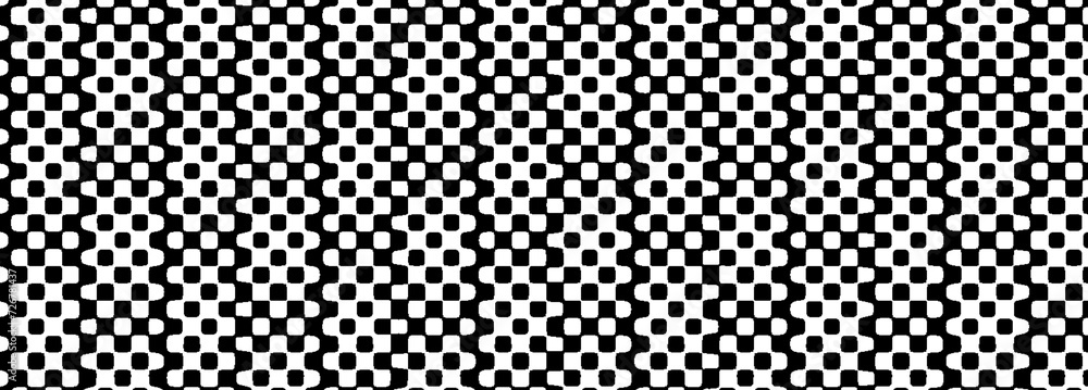 An abstract black and white halftone grunge texture background image. An abstract black and white halftone grunge texture background image.