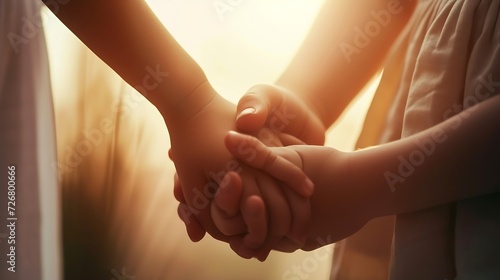 Close up compassionate young foster parent holding hands of little kid girl, giving psychological help, supporting at home. Sincere different generations family sharing secrets or maki : Generative AI