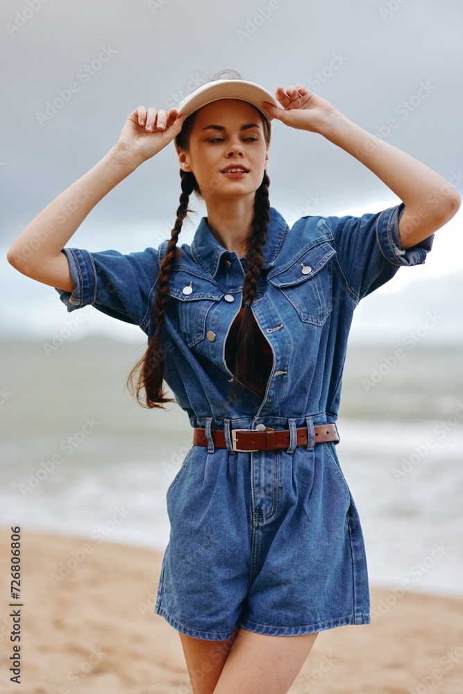 Sun-Kissed Beauty: A Pretty Young Lady Enjoying Summer by the Blue Sea, Posing Stylishly in a Casual White Dress and Stylish Hat Sun-Kissed Beauty: A Pretty Young Lady Enjoying Summer by the Blue Sea, Posing Stylishly in a Casual White Dress and Stylish Hat