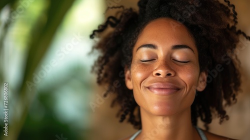 A woman with epilepsy smiling as she practices yoga and mindfulness techniques to manage her condition.