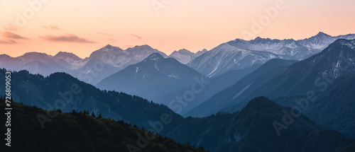 Breathtaking View of Snow-Capped Peaks at Twilight: A Serene Landscape Immersed in Nature's Splendor