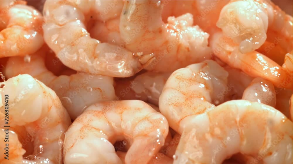 Drops of water drip onto fresh shrimp. Filmed on a high-speed camera at 1000 fps. High quality FullHD footage Drops of water drip onto fresh shrimp. Filmed on a high-speed camera at 1000 fps. High quality FullHD footage