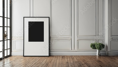 Blank black poster frame on a light wooden floor  ideal for empty picture frame mockups