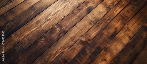 Text design space on brown wooden floor.