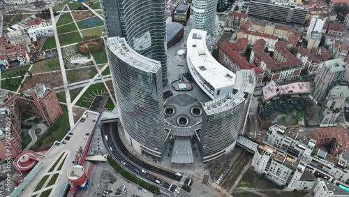 The high tower of the unicredit bank. Square with fountains in 4k photo