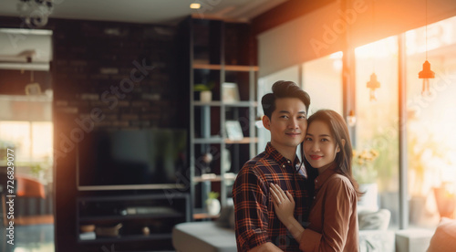 young asian couple hugging in their warm sunny home, generated by AI