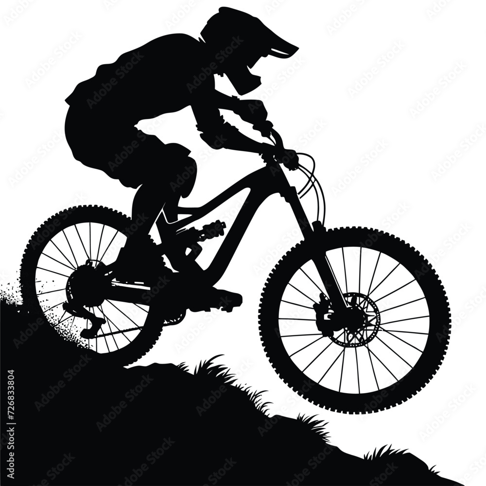 Naklejka premium Silhouette of a Mountain Biker in Action