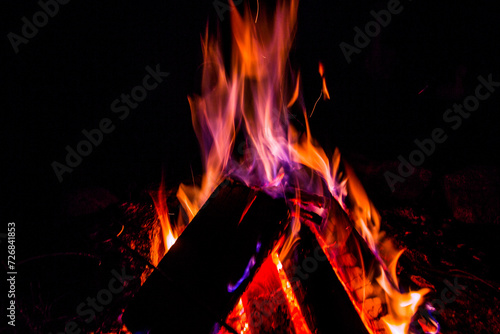 Bonfire at night. Night at the lake Summer travels. Relaxing by the fire