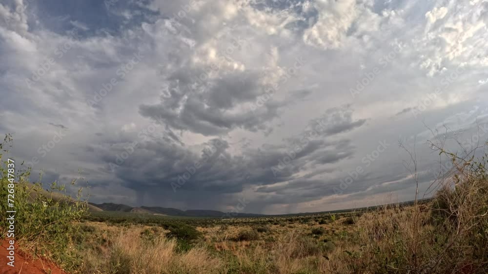 This brief timelapse captures the dynamic evolution and graceful dance of clouds across the beautiful African landscape of the Southern Kalahari This brief timelapse captures the dynamic evolution and graceful dance of clouds across the beautiful African landscape of the Southern Kalahari