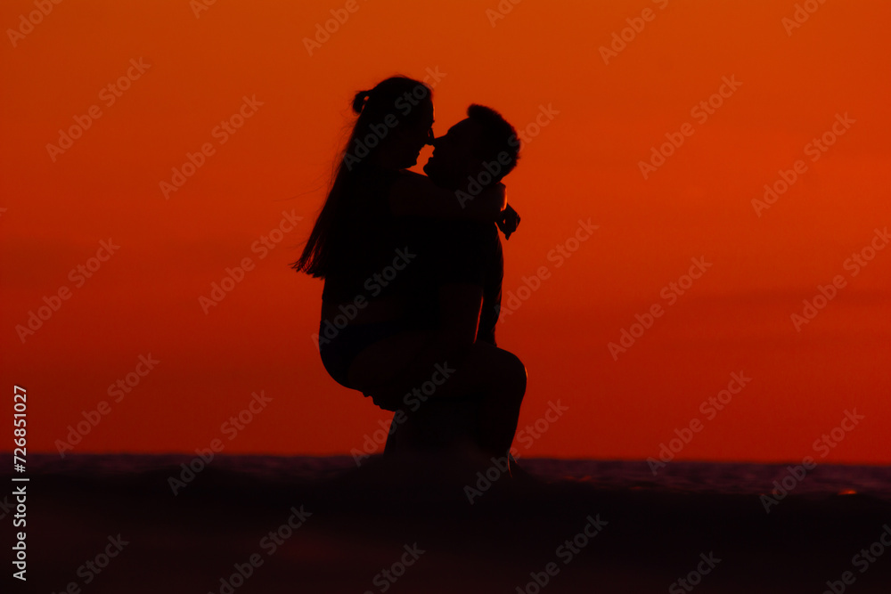 lovers, sunset in the background, Valentine's Day, travel, vacation
