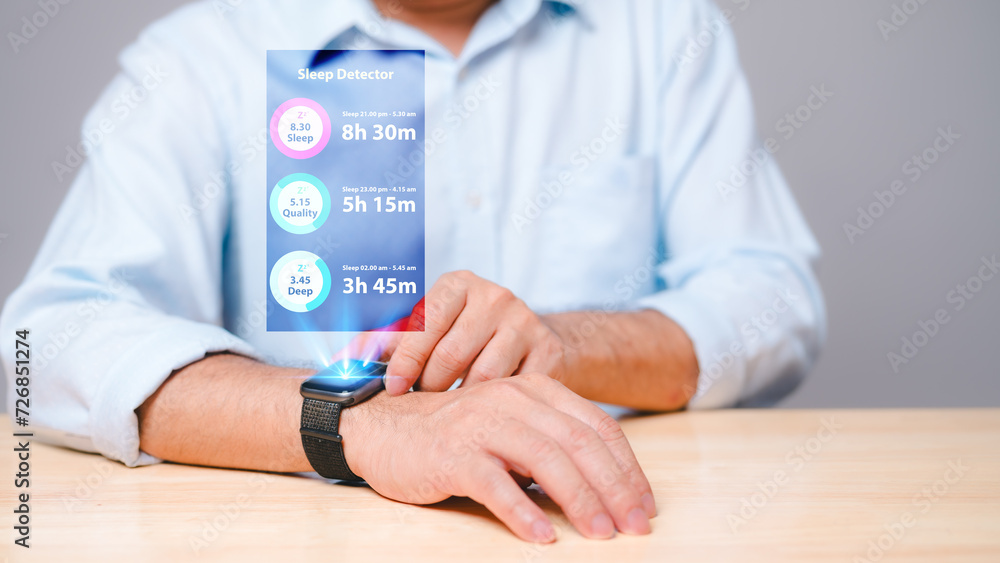 Using a health monitoring watch, a person employs cutting-edge technology to track and check their well-being, with vital health metrics displayed on the device's screen through a dedicated app. Using a health monitoring watch, a person employs cutting-edge technology to track and check their well-being, with vital health metrics displayed on the device's screen through a dedicated app.