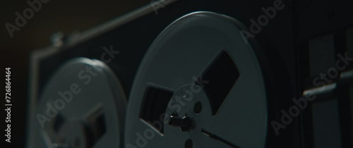 A vintage recorder in the dark and moody room