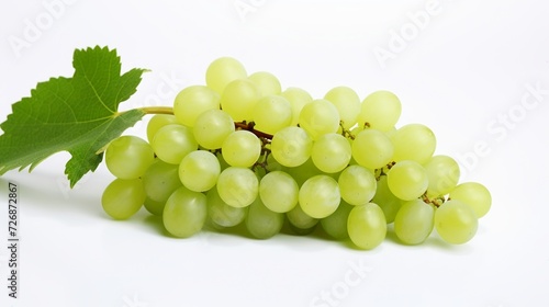 green grapes on a white background with drops of water