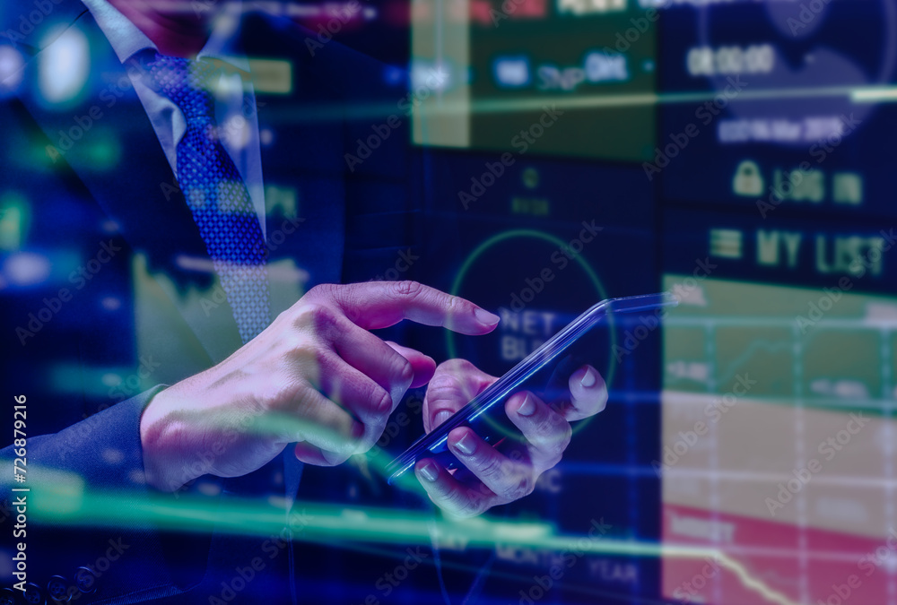 Fototapeta premium Businessman showing growing virtual holographic stock,positive indicators, businessman calculates financial data for long-term investments. 