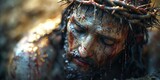 Profound sorrow on Jesus' face, crown of thorns. A close-up depicts a man portraying Jesus Christ, his face marked by profound sorrow, crowned with thorns, and wet with water and blood