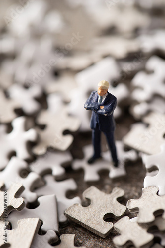 businessman with puzzle piece