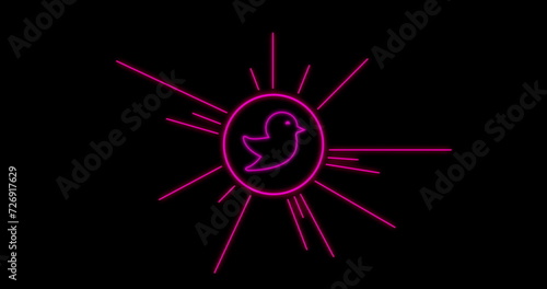 Image of neon circle with twitter symbol over black background