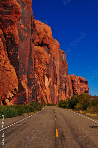 Red sandstone cliffs on the Utah State Route 279, the Lower Colorado River Scenic Byway U-279, or Potash Road, downstream from Moab, Utah, southwest USA.