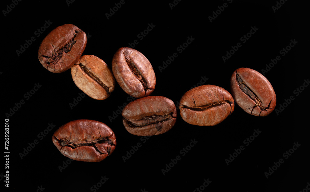 Coffee beans isolated on black background. Close-up Coffee beans isolated on black background. Close-up