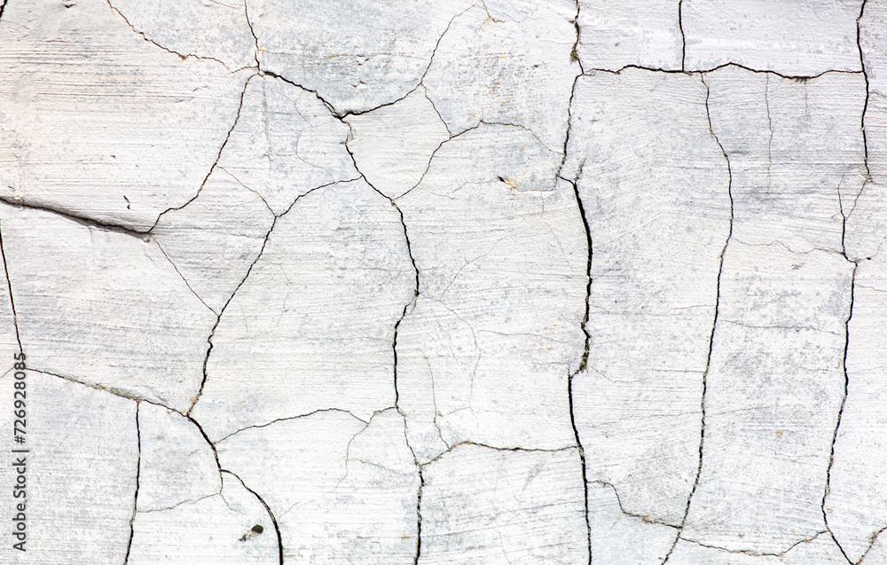 Obraz premium Cracked concrete as an abstract background. Texture