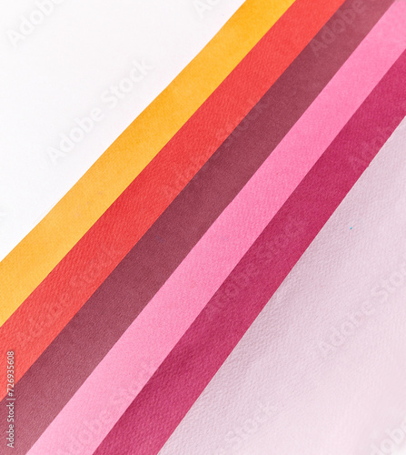 Abstract background with triangular lines such as shape and blank space for creative design markers, intersectioned with rainbow-colored paper