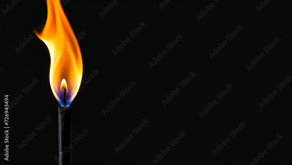 Vivid flame from black candle against dark, solemn background, illuminating space with intense yet somber light, evoking sense of mourning and remembrance Vivid flame from black candle against dark, solemn background, illuminating space with intense yet somber light, evoking sense of mourning and remembrance