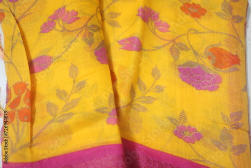 indian traditional saree or sari made of different material like silk, cotton, raw silk, tussar silk etc., photo