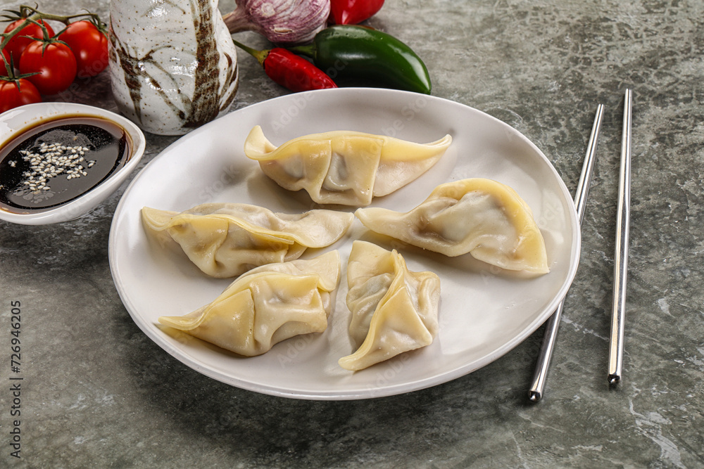 Japanese cuisine - dumplings gyoza with sauce Japanese cuisine - dumplings gyoza with sauce