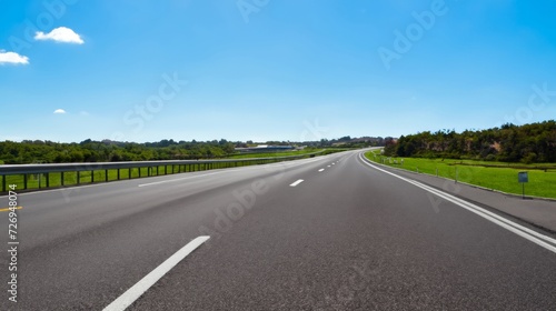 road in the countryside, empty highway on a sunny day photo
