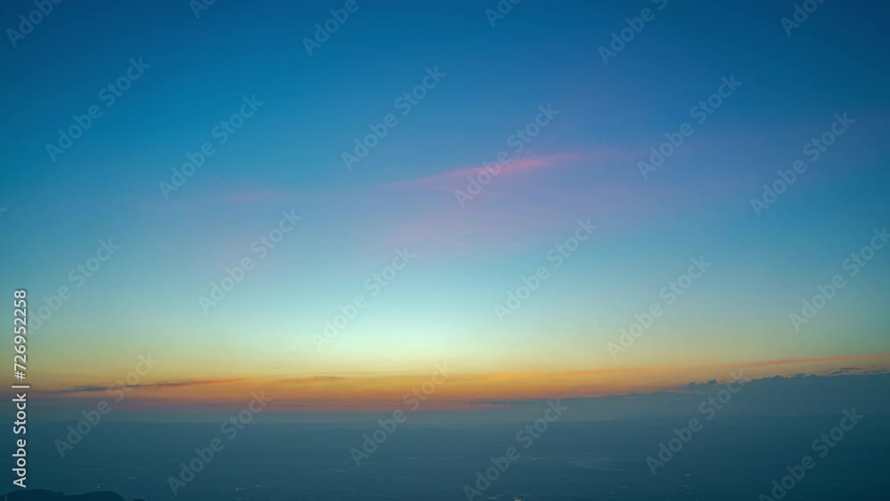 Time lapse stunning sky in sunrise over the large valley at Phu Tub Berk Phetchabun Thailand. .The beauty of sky fits perfectly with the charming nature. .Nature video 4K High quality footage. Time lapse stunning sky in sunrise over the large valley at Phu Tub Berk Phetchabun Thailand. .The beauty of sky fits perfectly with the charming nature. .Nature video 4K High quality footage.