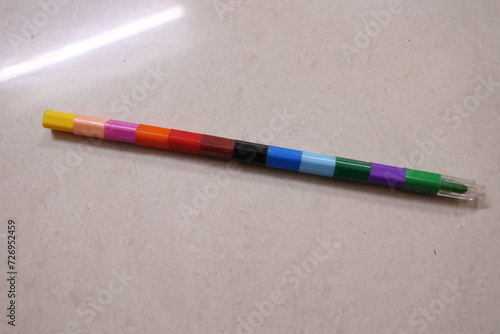 a color pencil on a floor
