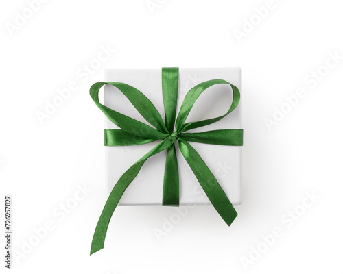 Top view of white gift box with green ribbon isolated on white background