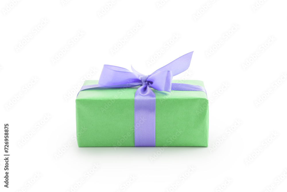 Green paper present box with violet ribbon bow isolated on white background Green paper present box with violet ribbon bow isolated on white background