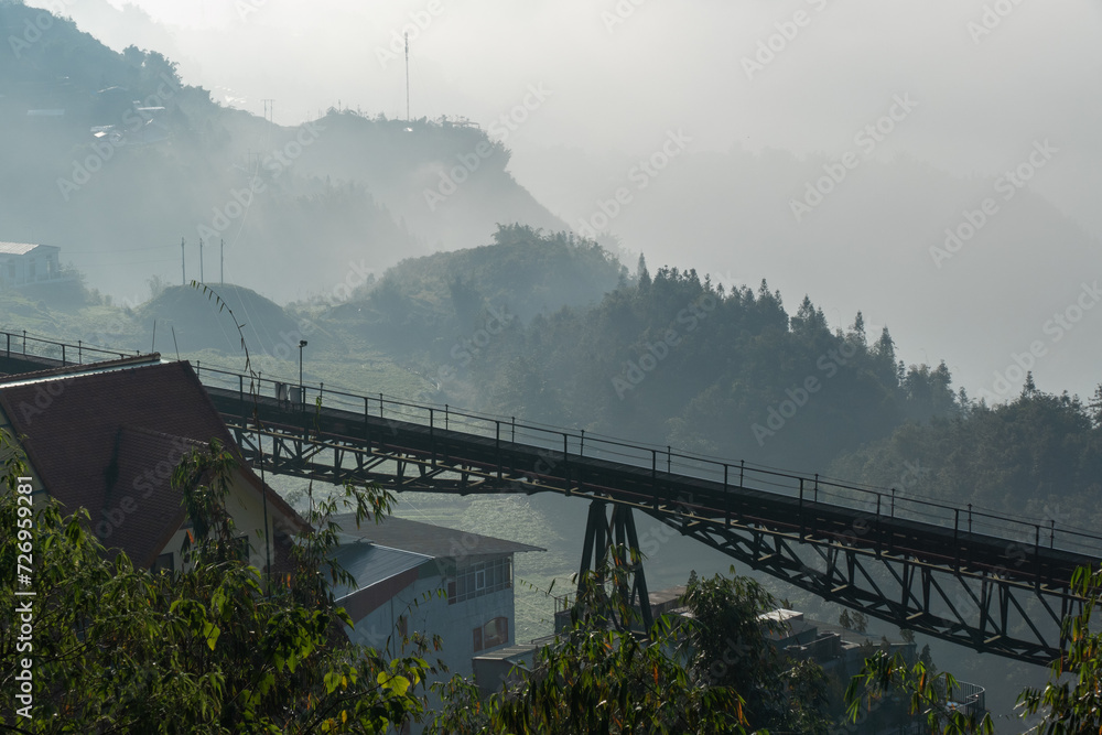 Fototapeta premium Fansipan Mountain Tramway, is a Tram railway for ride to Cable Car Station to Fansipan Peak in Sa Pa, Vietnam