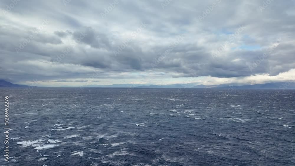 Large waves at sea on a windy day with clouds Large waves at sea on a windy day with clouds