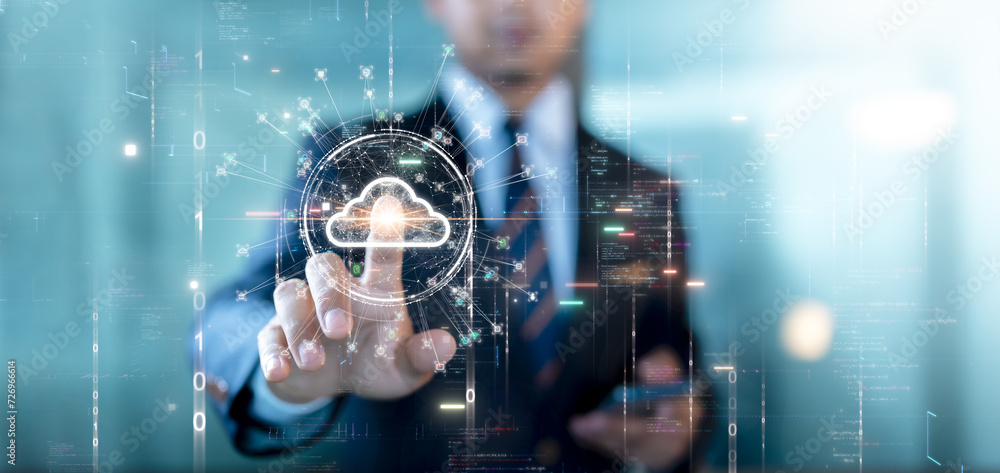 Cloud or edge computing technology concept. Businessman is using his fingers to select a cloud icon connecting accessing global usage data. Abstract binary code on background. - obrazy, fototapety, plakaty 