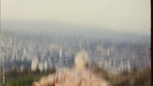 Man running. Back view shot on 8mm photo