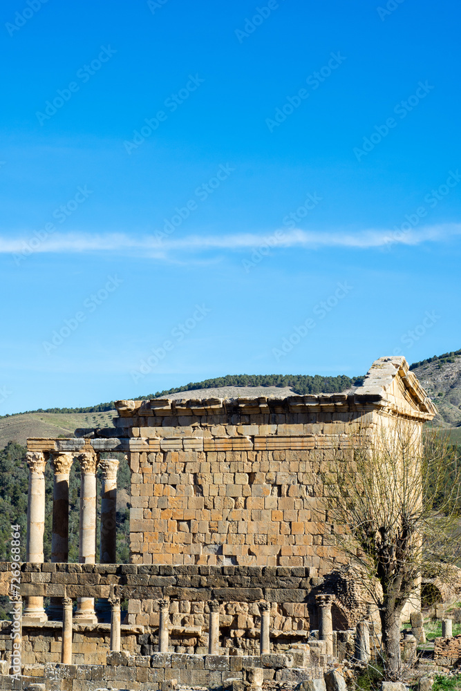 High-angle view of a Roman temple against the sky in the ancient Roman town of Djemila, Setif, Algeria.